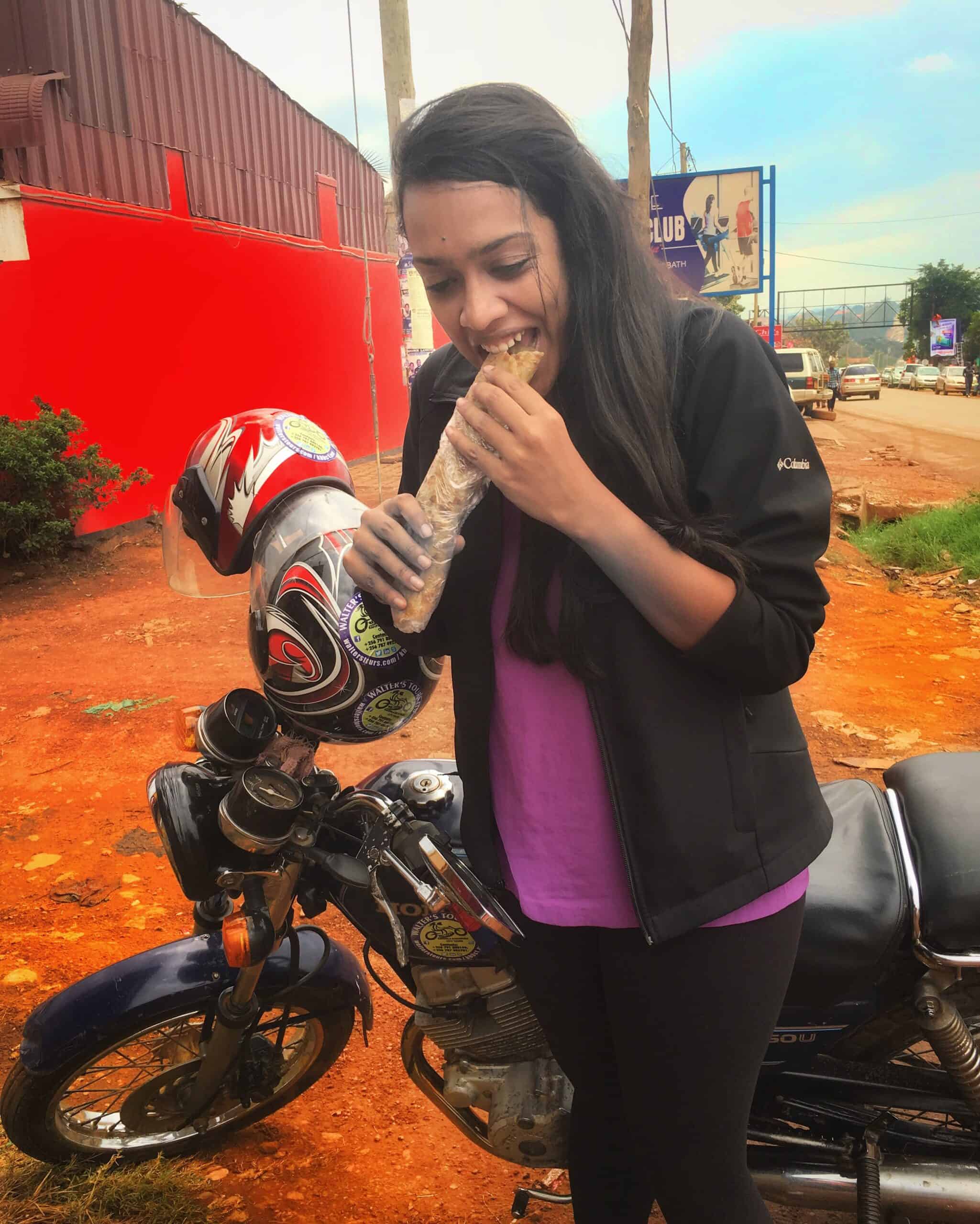 Shruthi eating Rolex in Uganda. 