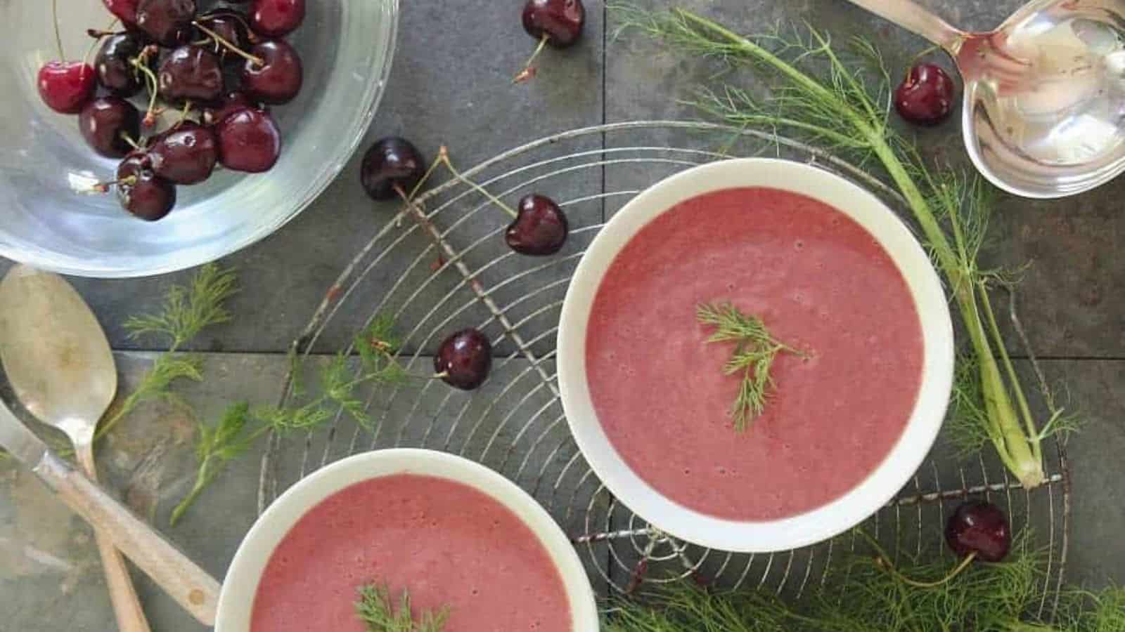 Overhead view of 2 bowls of chilled cherry fennel soup.