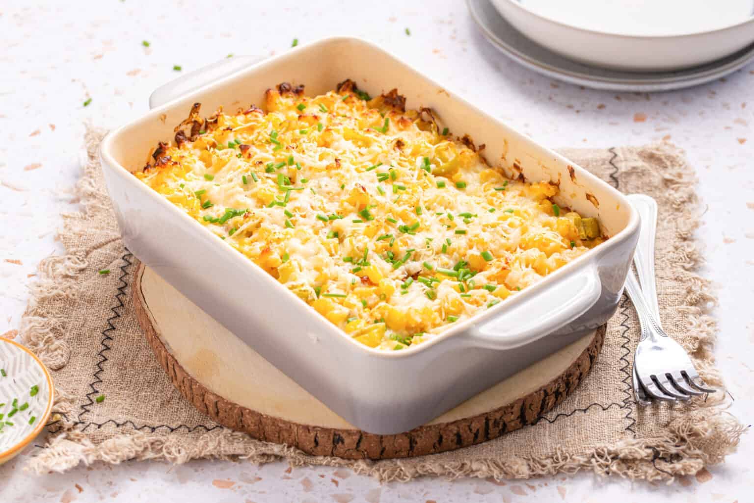 An image of corn casserole with cream cheese, ready to be served.