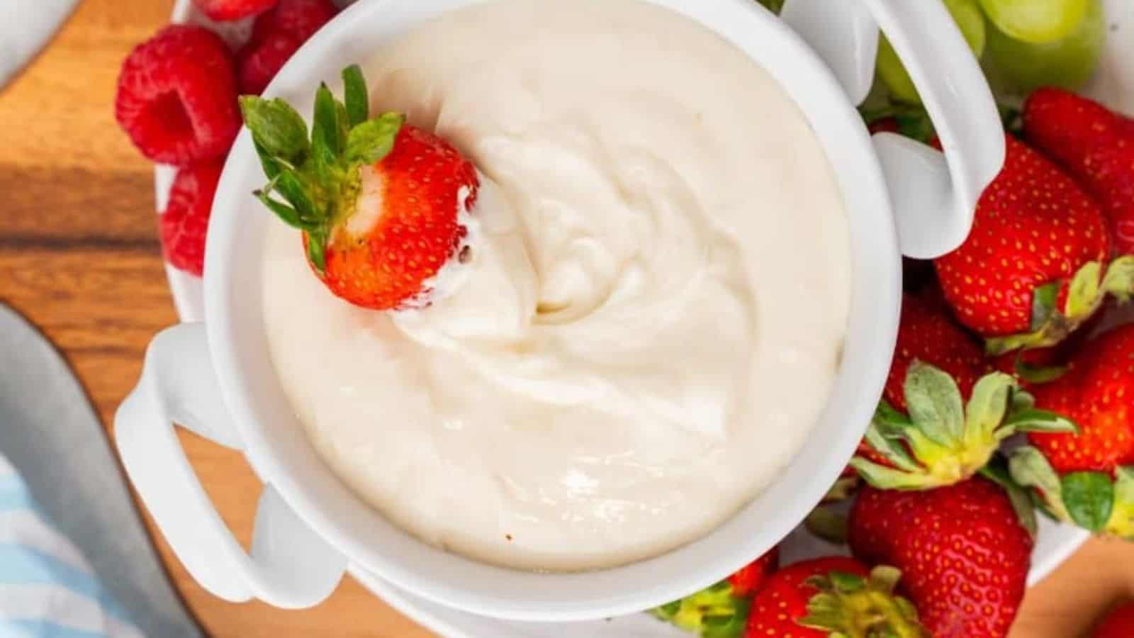 Overhead view of easy cream cheese fruit dip in a bowl.