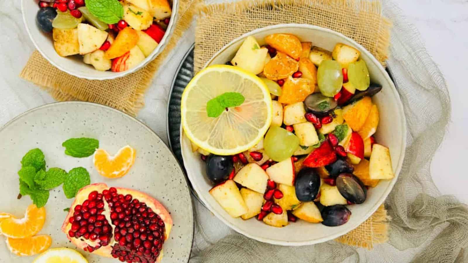 Overhead image of fruit chaat (indian fruit salad) in a bowl.