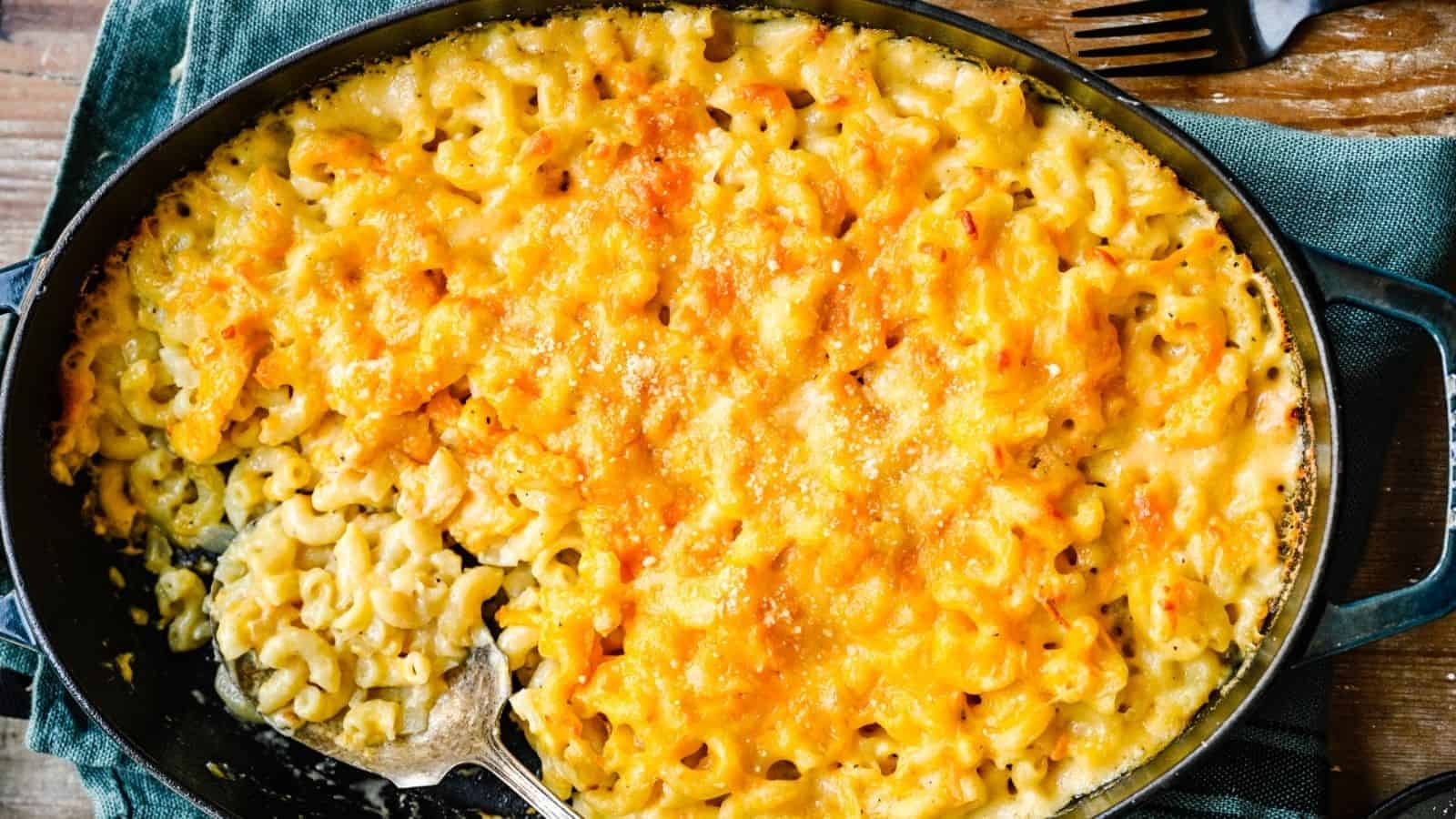 An overhead image of a cooked gouda mac and cheese in a baking pan.