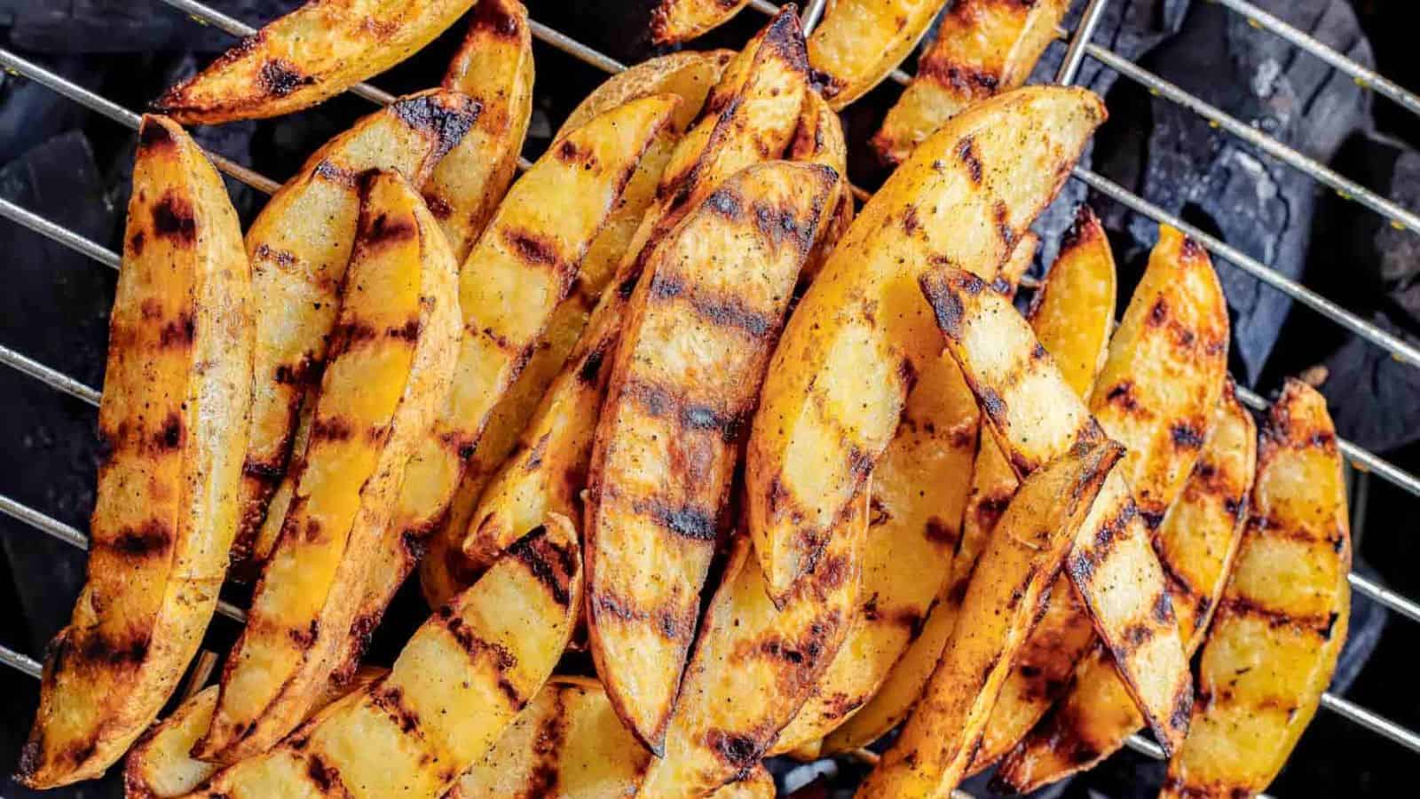 Close-up of grilled potato wedges.