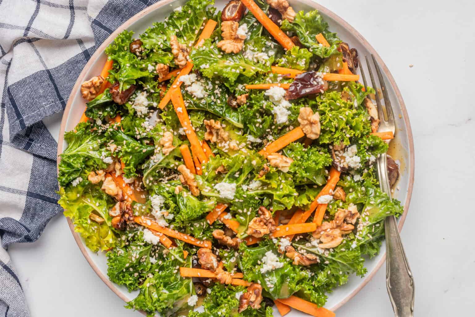 An overhead image of kale salad in a large serving bowl.