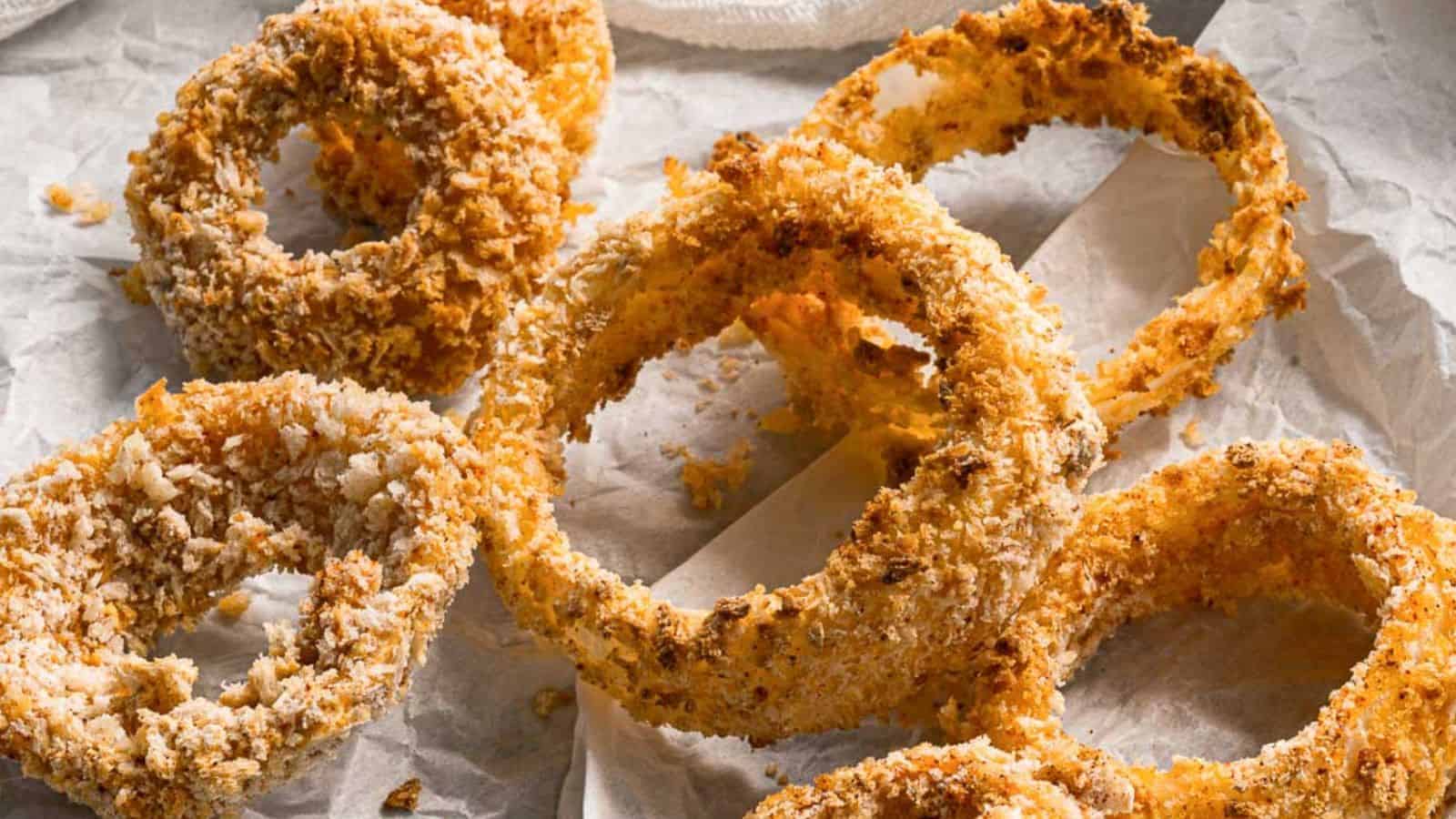 A horizontal image of air fryer onion rings.
