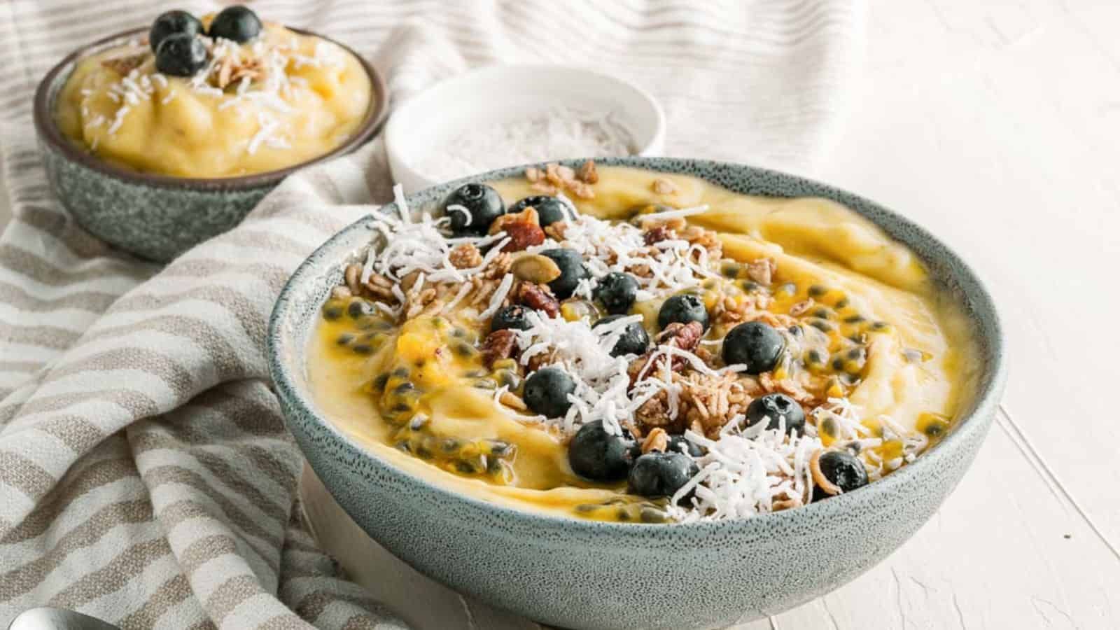 Close-up of mango banana smoothie bowl.