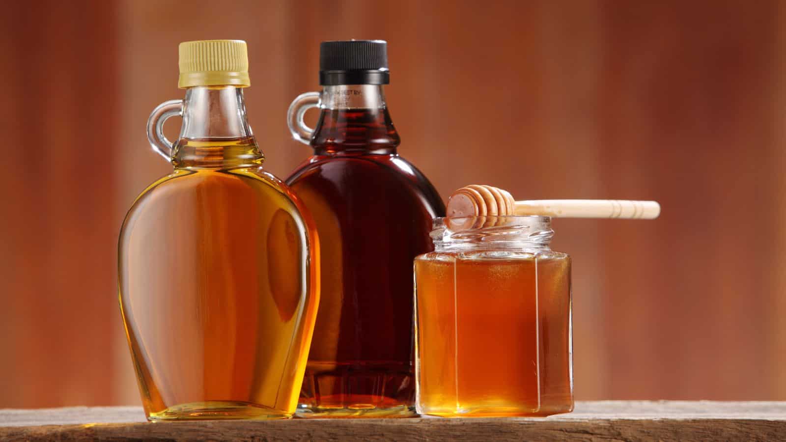 Syrups in bottles and honey.