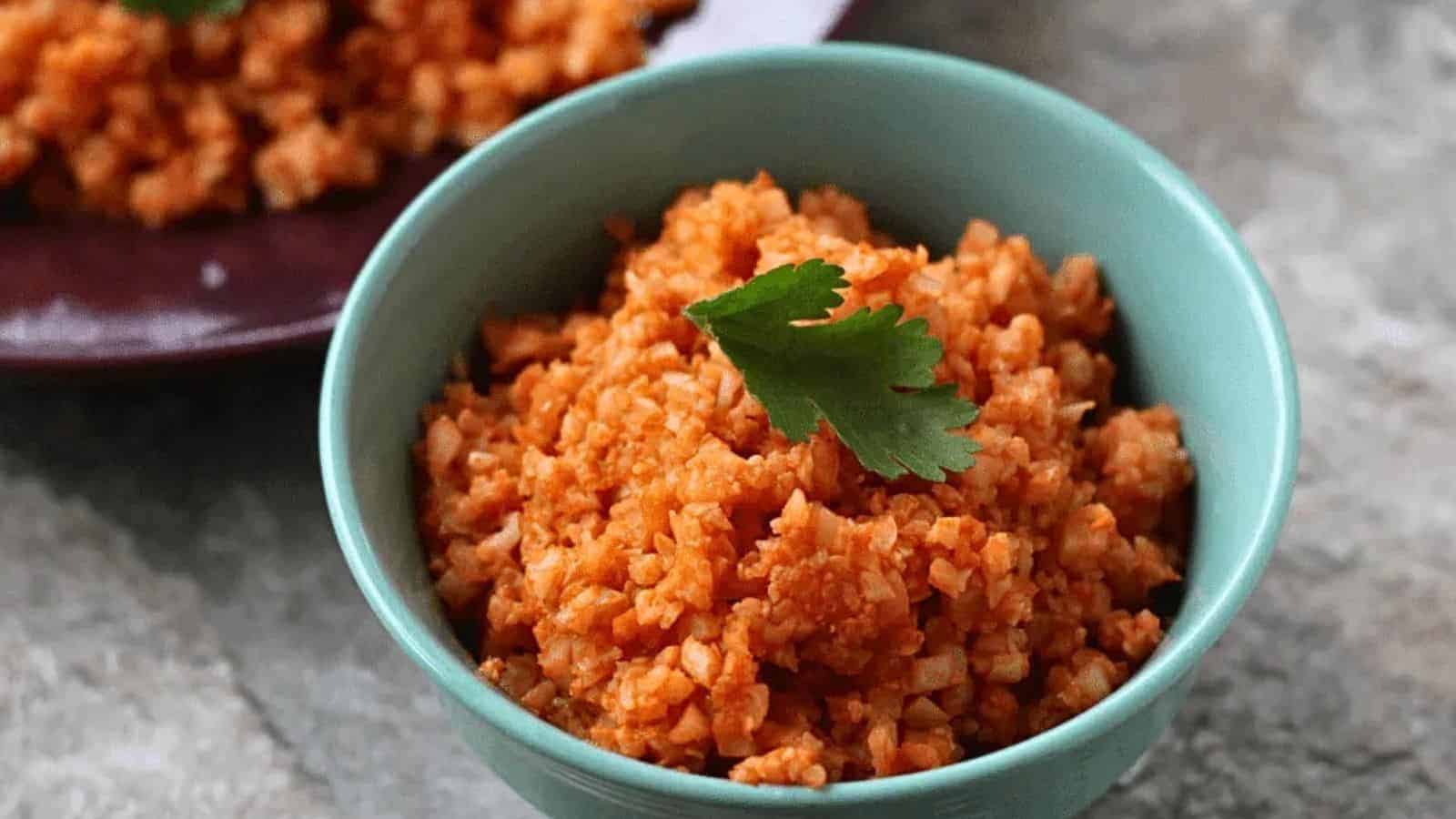 Teal bowl of cauliflower rice.