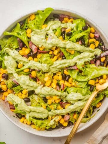 An overhead image of Mexican corn salad with the ingredients fully mixed together.