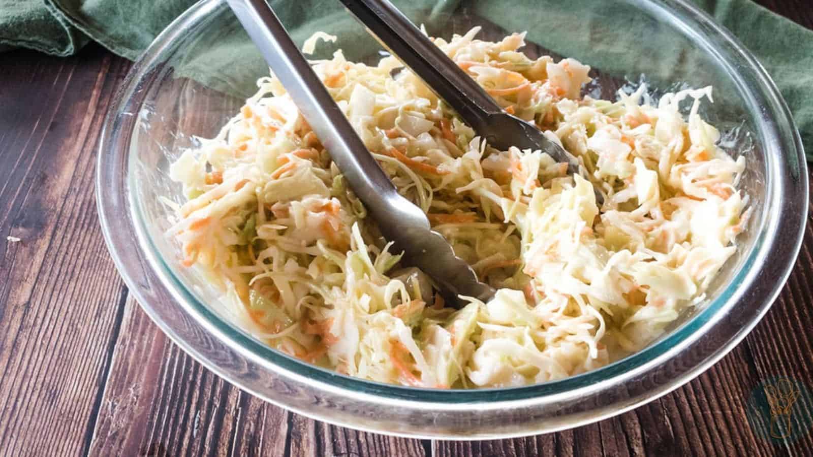 A picture of Popeyes coleslaw copycat recipe in glass bowl.