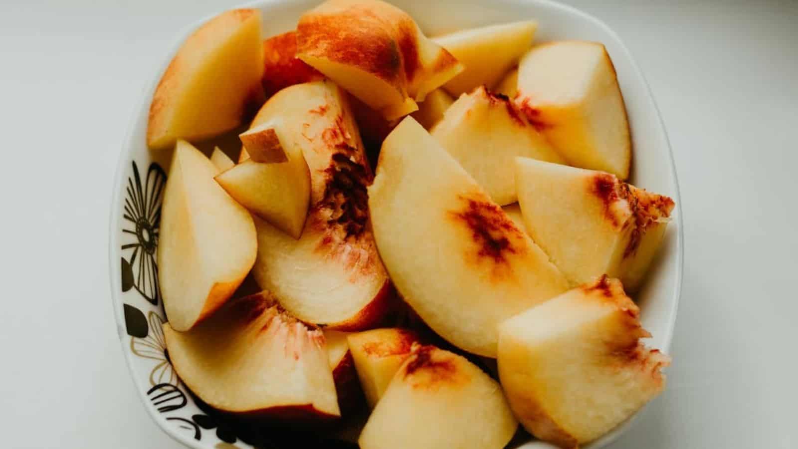 Sliced Apples on White Ceramic Bowl.