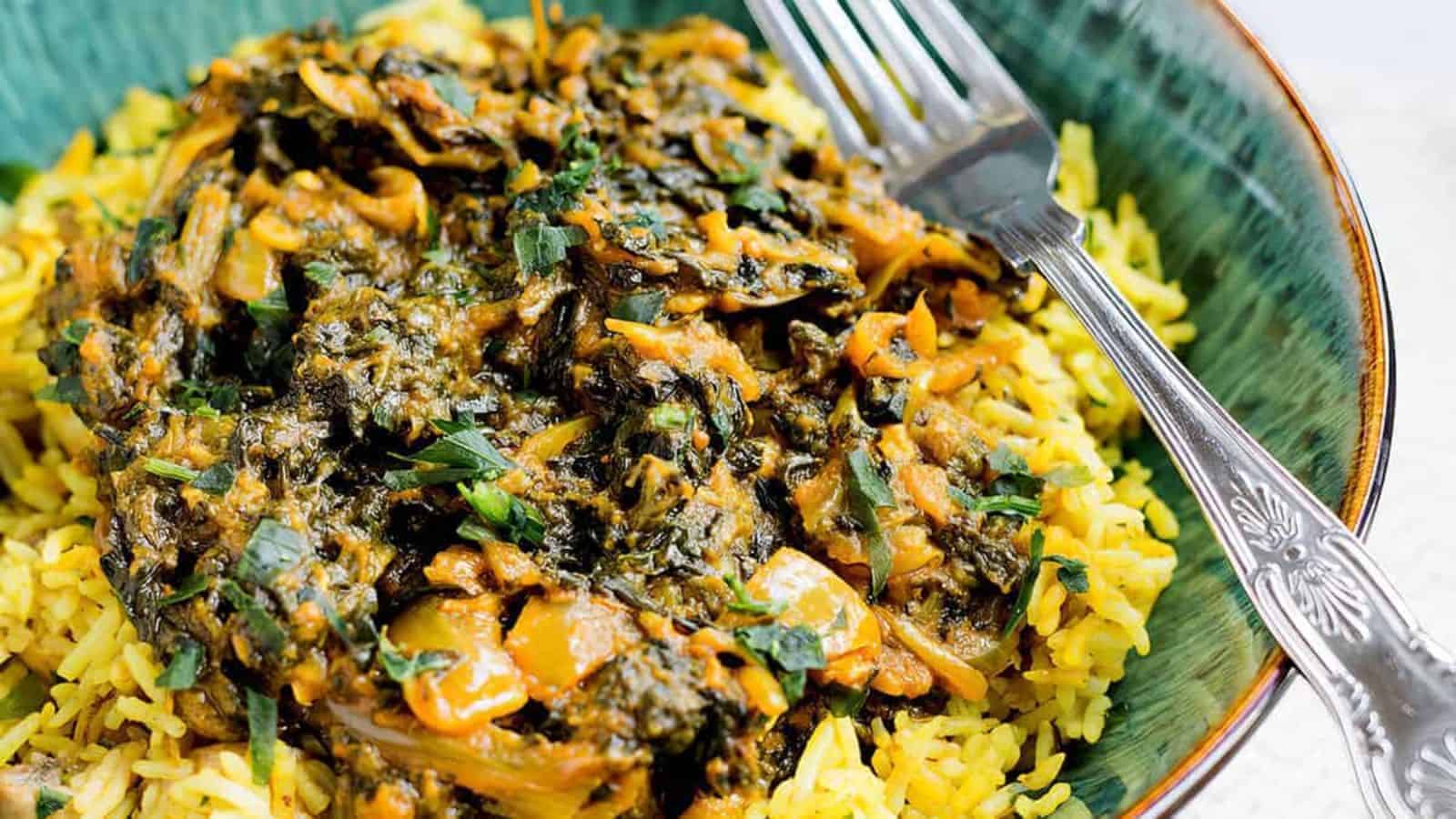 Sag Bahji {Spinach Curry} served over rice in bowl.