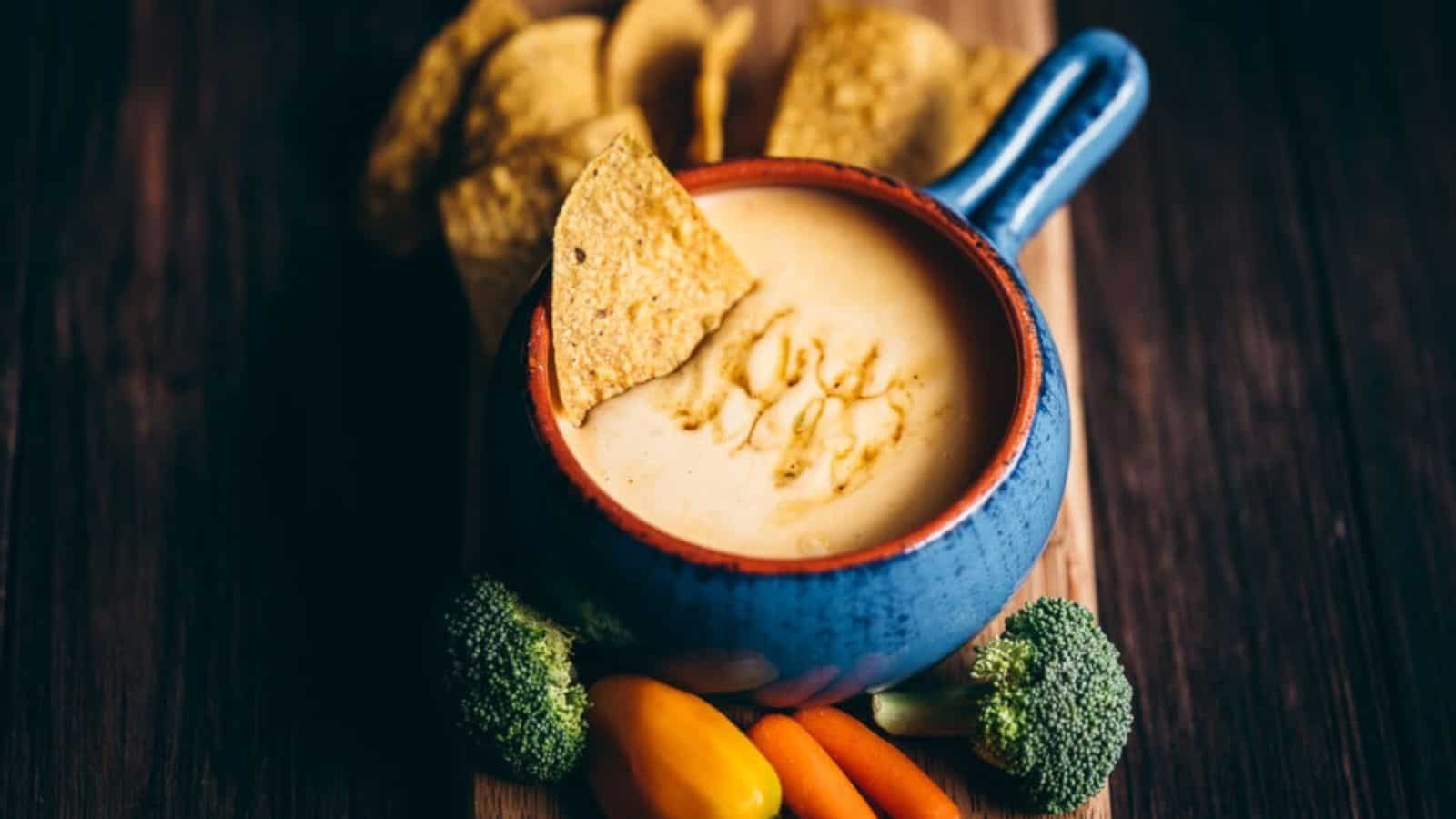 Close-up image of sweet and spicy ghost pepper queso.
