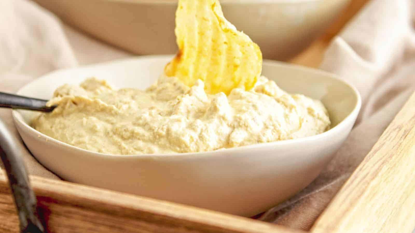 Close up of vegan onion dip in a bowl.