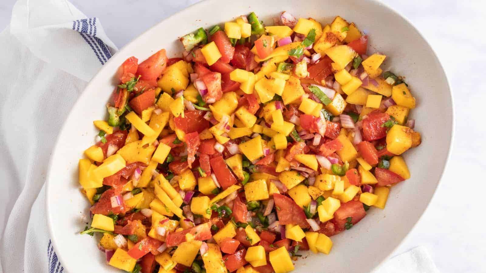 An overhead image of mango salsa in a serving plate.