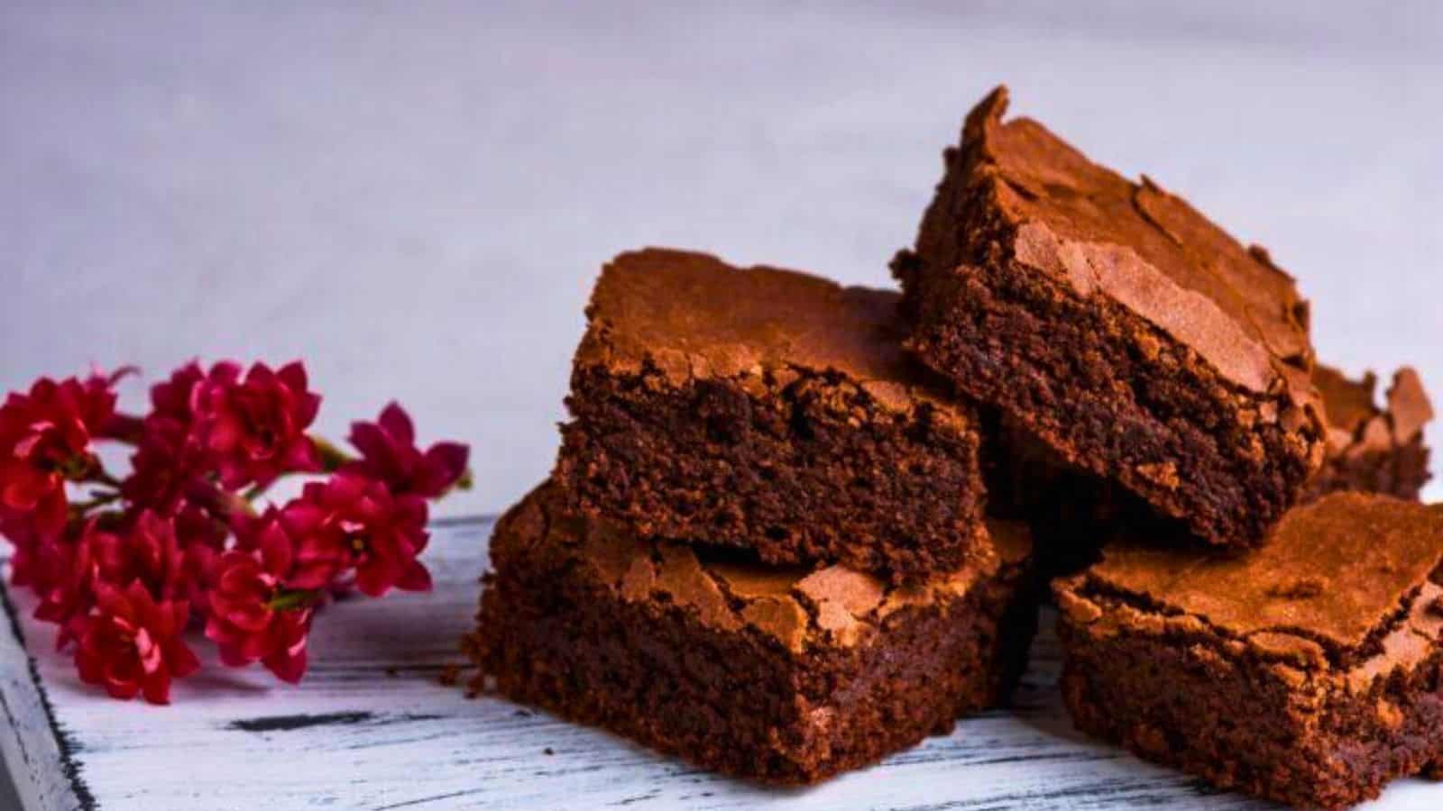 Pile of Milky Way brownies on light blue plate.