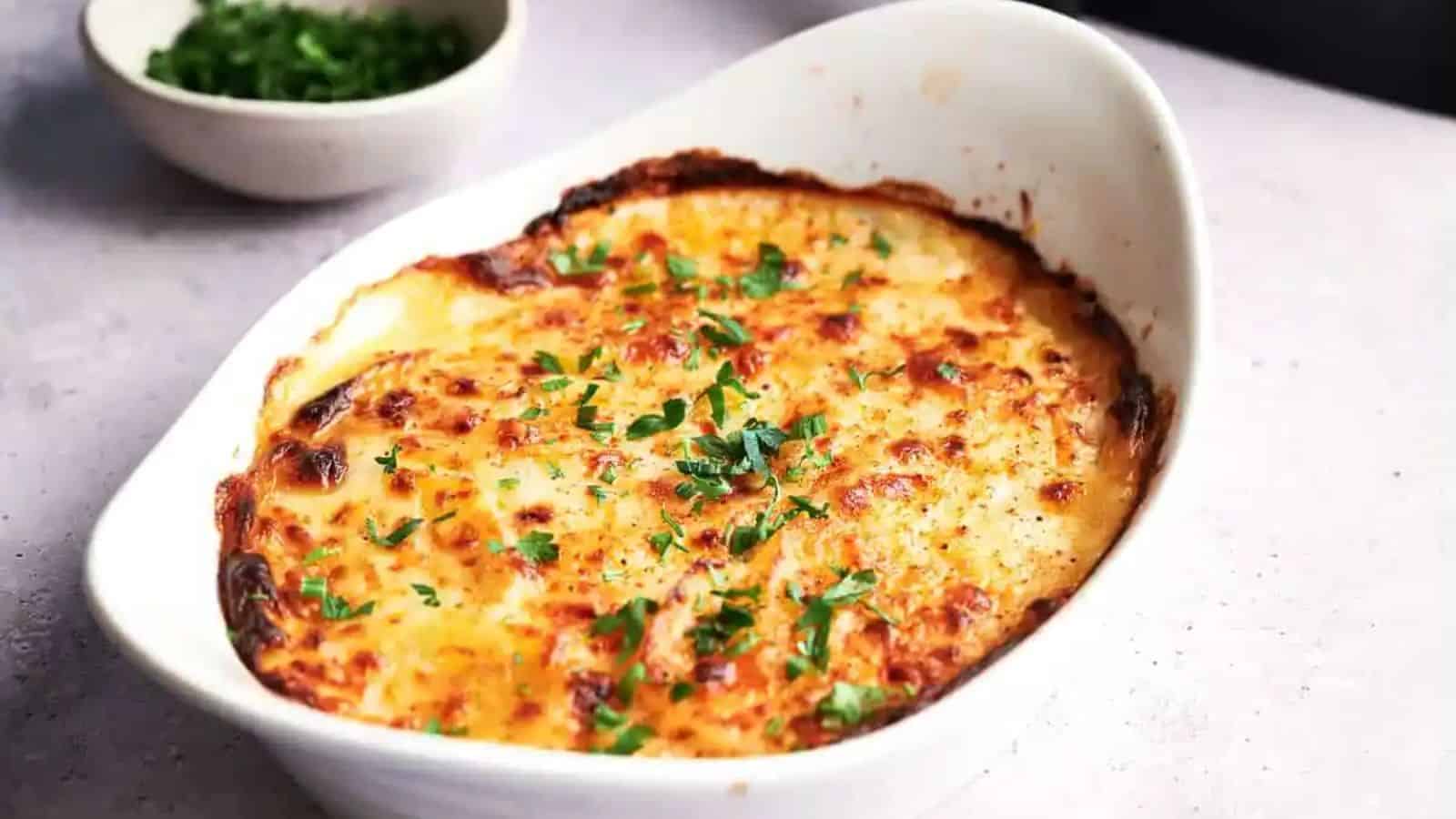 An image of an air fryer scalloped potatoes.