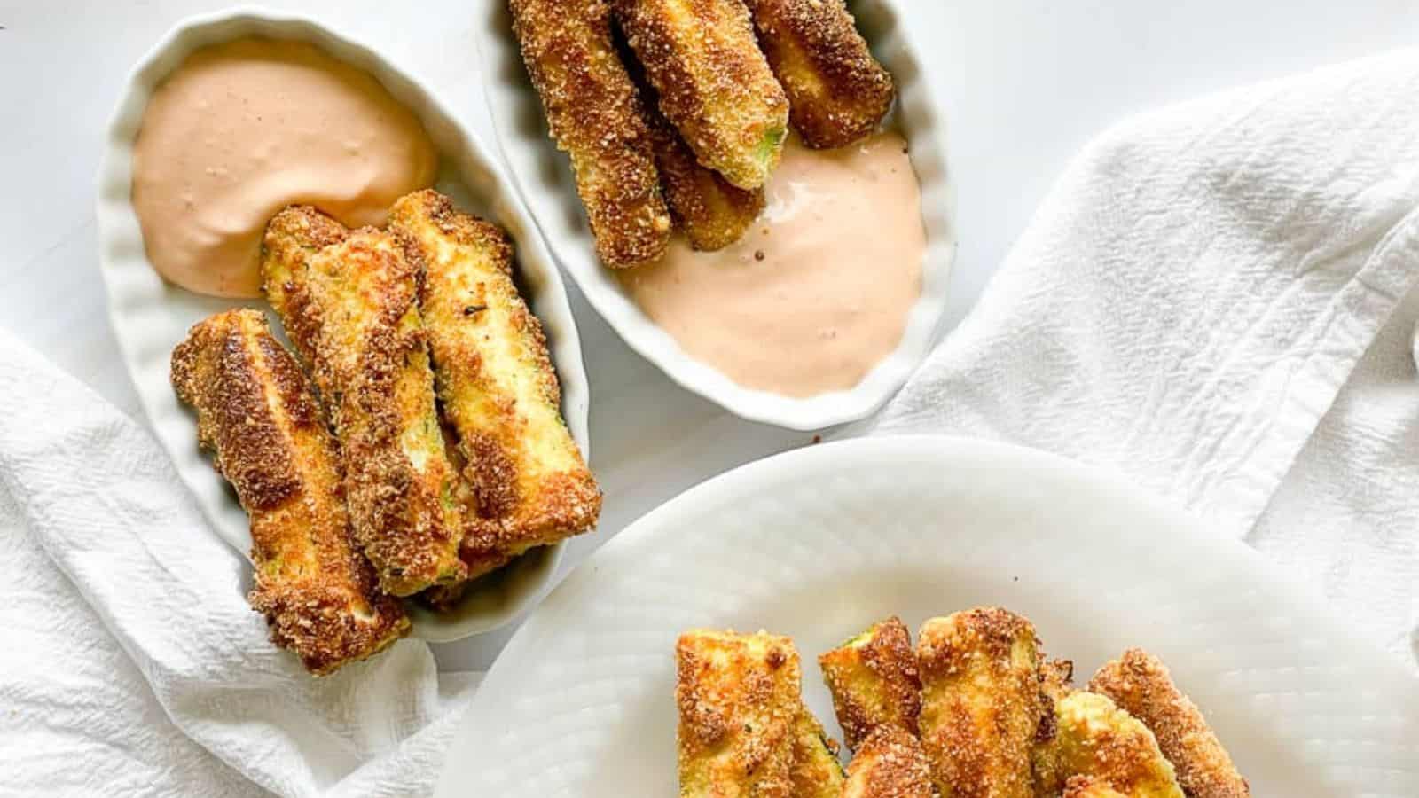 Air fryer zucchini fries with a dip.