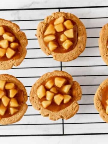 Overhead image of 6 apple pie cookies.