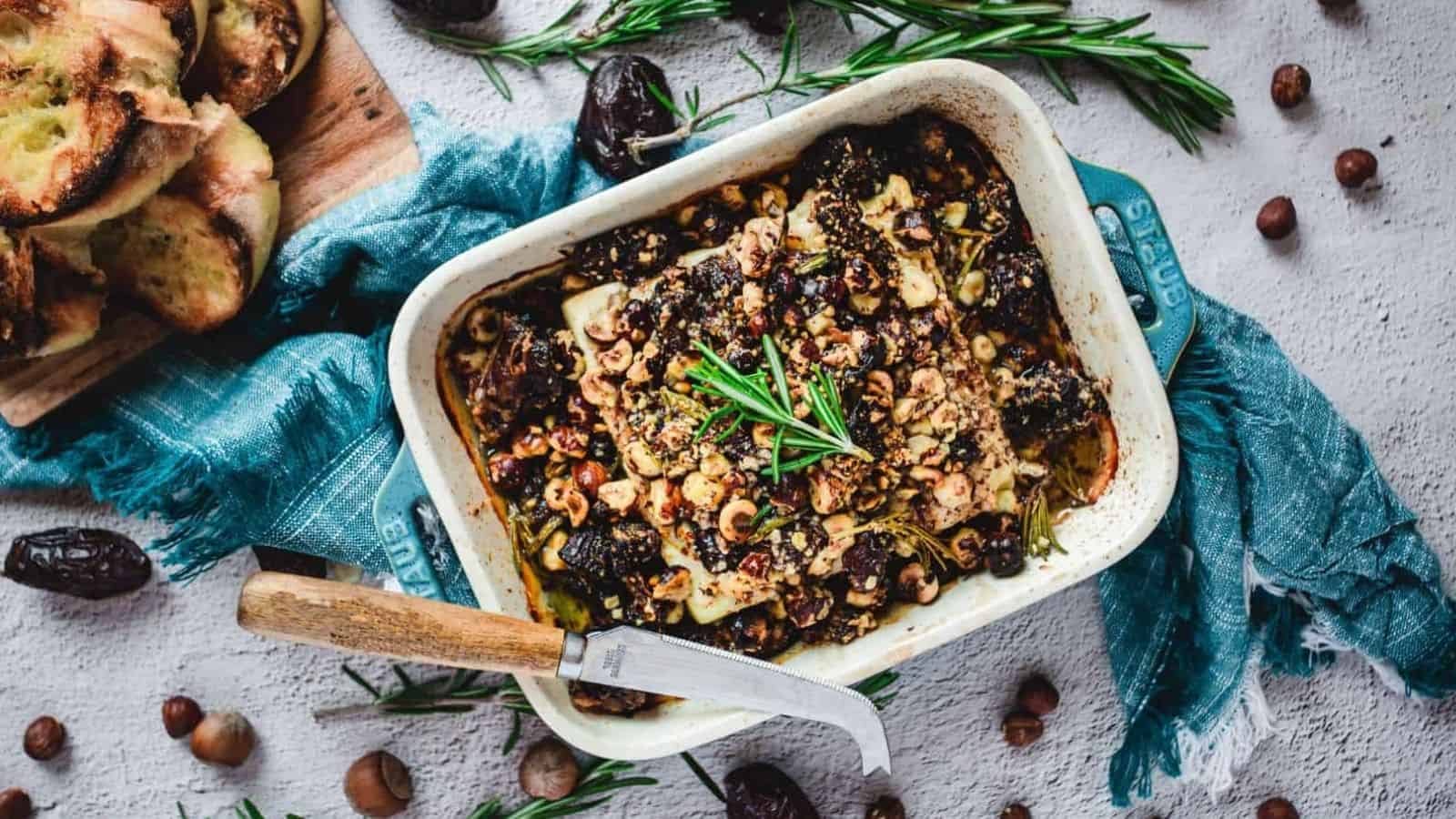 Baked feta in blue casserole dish.