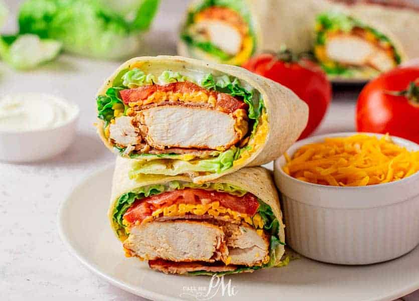 Chicken, bacon, lettuce, and tomatoes wrapped in tortilla.