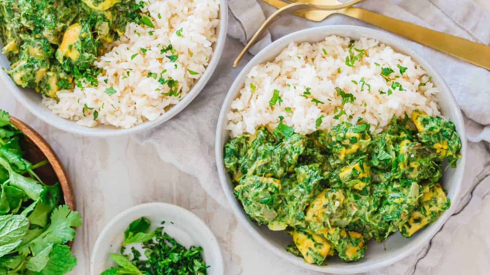 Two bowls of chicken saag.
