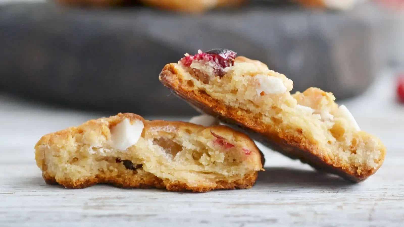 Cranberry cookies with a bite taken out of them.