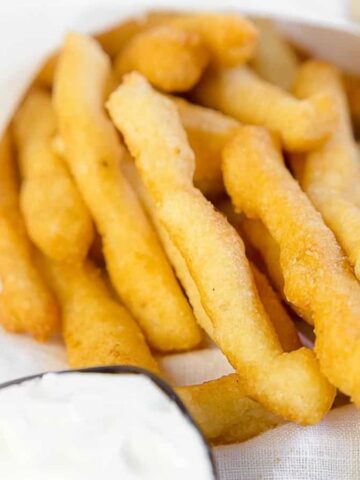 Keto French Fries on the table with ketchup and mayo.