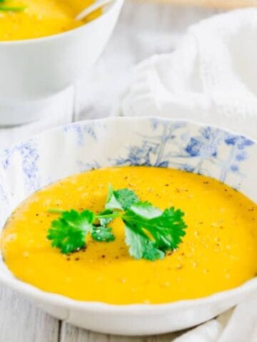 Bowls of Easy Blender Pumpkin Potato Soup.