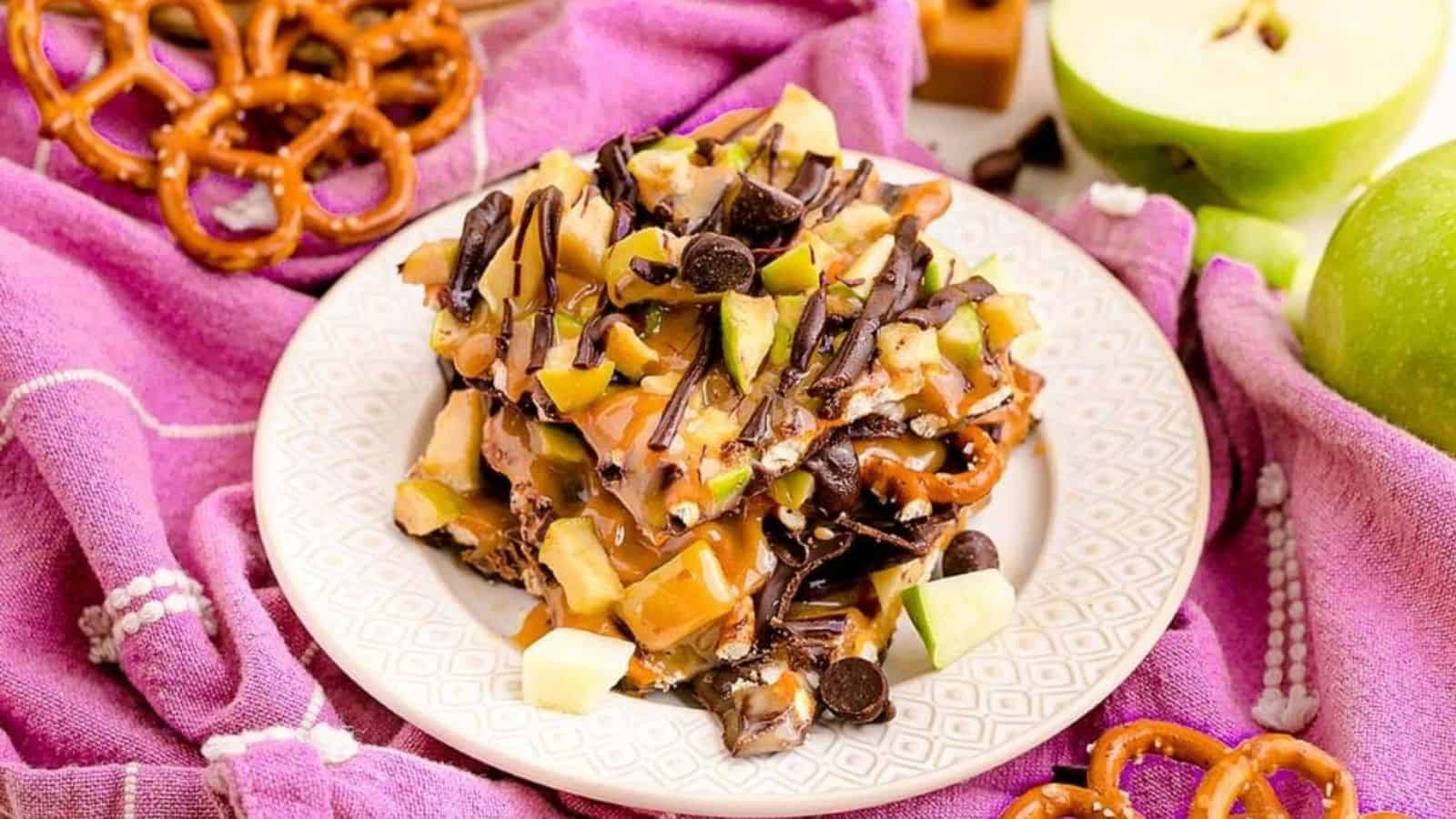 Close-up image of easy caramel pretzel apple bark in a plate.