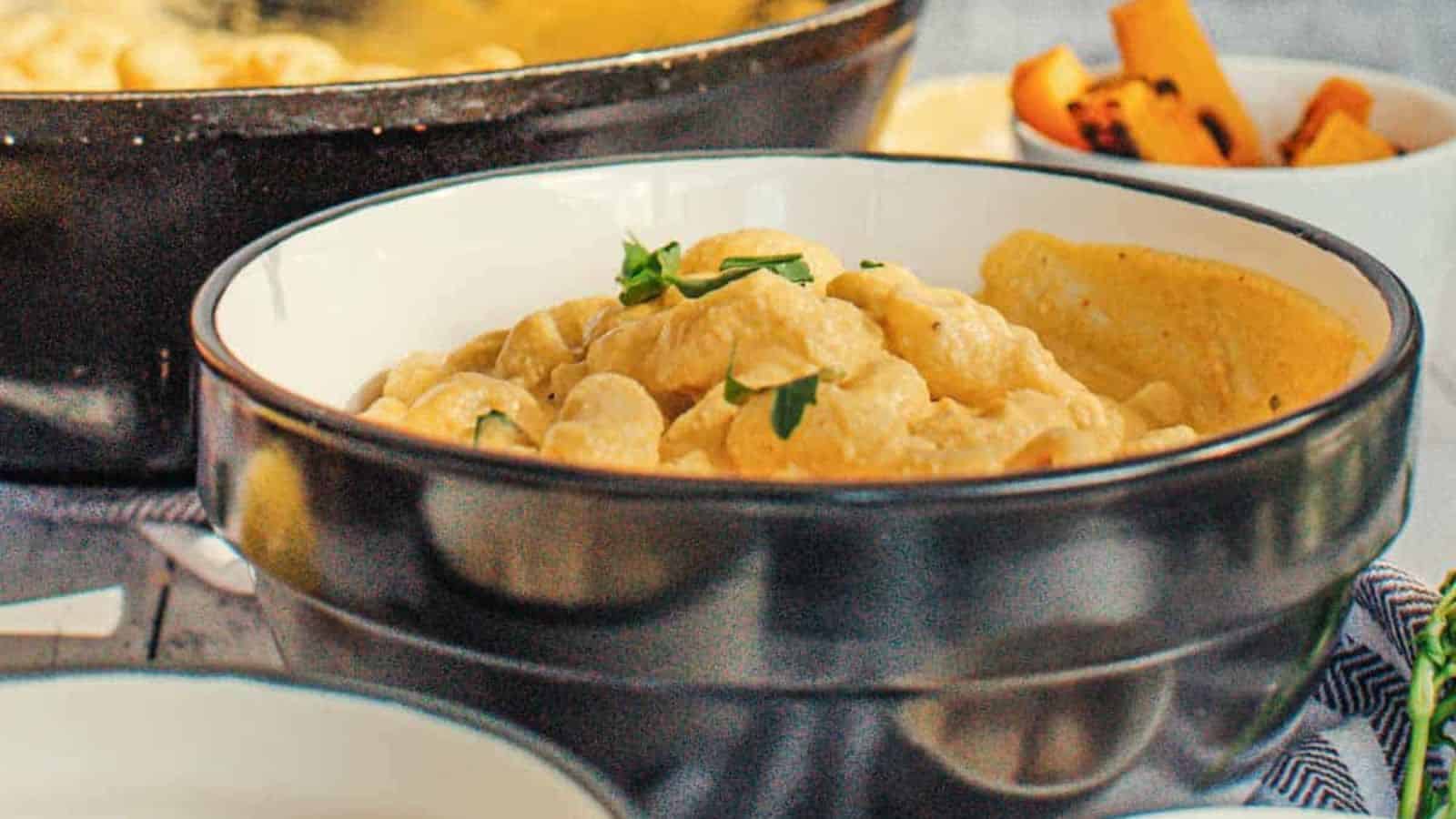 A bowl of vegan pumpkin mac and cheese.