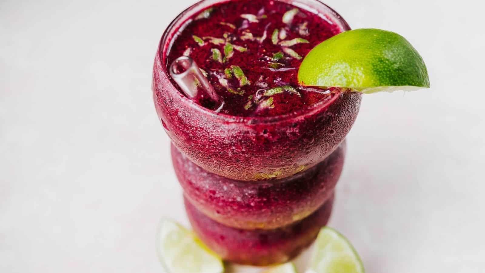 Close-up image of blueberry margarita mocktail.