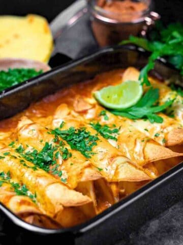 Mexican enchiladas in a baking dish.