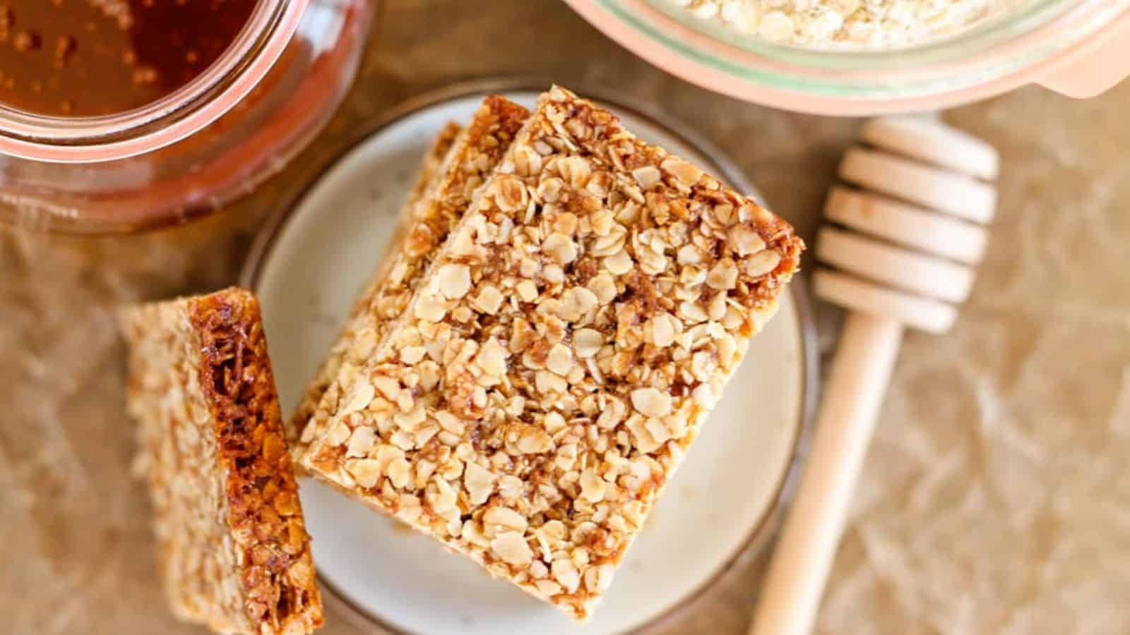 An overhead image of a plate of honey oatmeal bars.