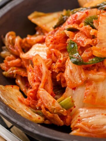 A bowl of kimchi.