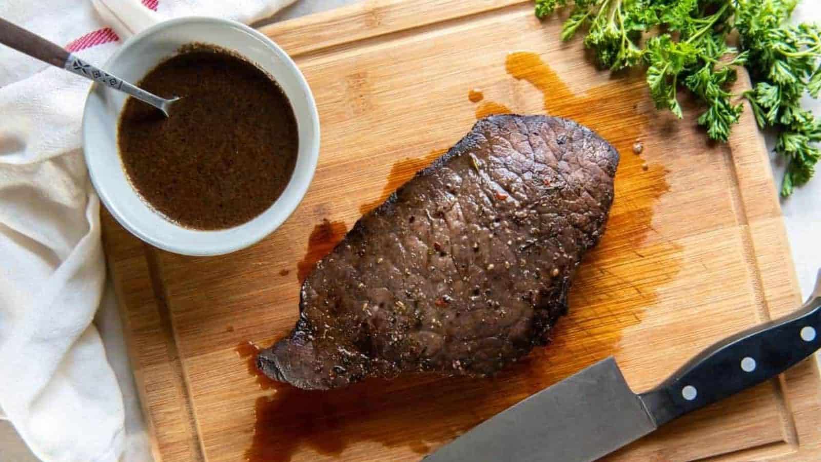 London broil marinade on a wooden board.