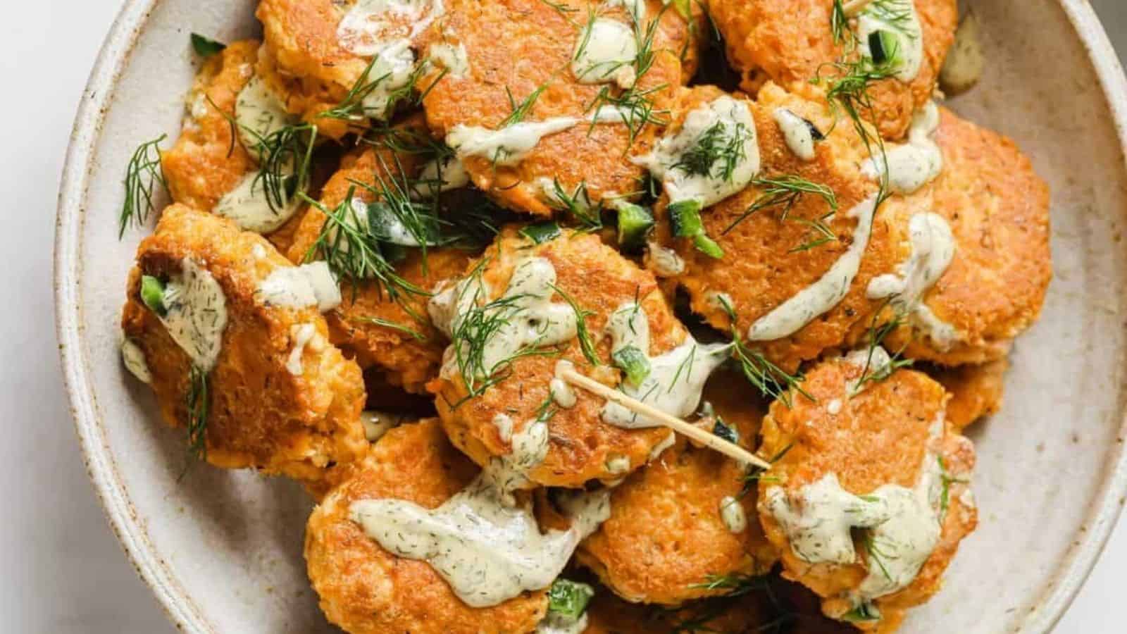 Mini spicy canned salmon patties in a serving bowl.