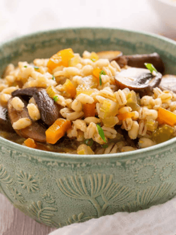 An image of mushroom barley soup in a bowl.