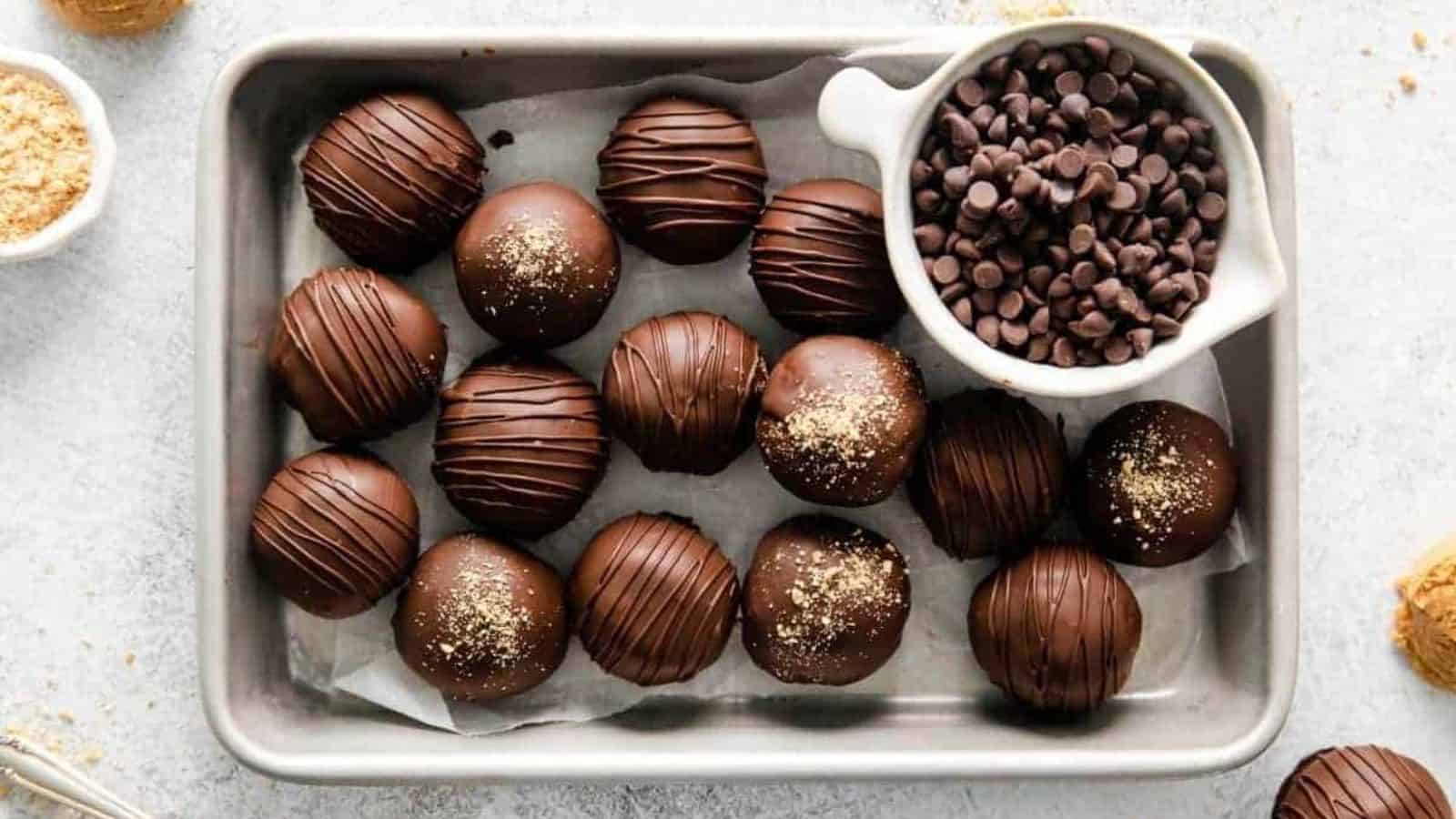 An image of peanut butter balls with chocolate and graham crackers.