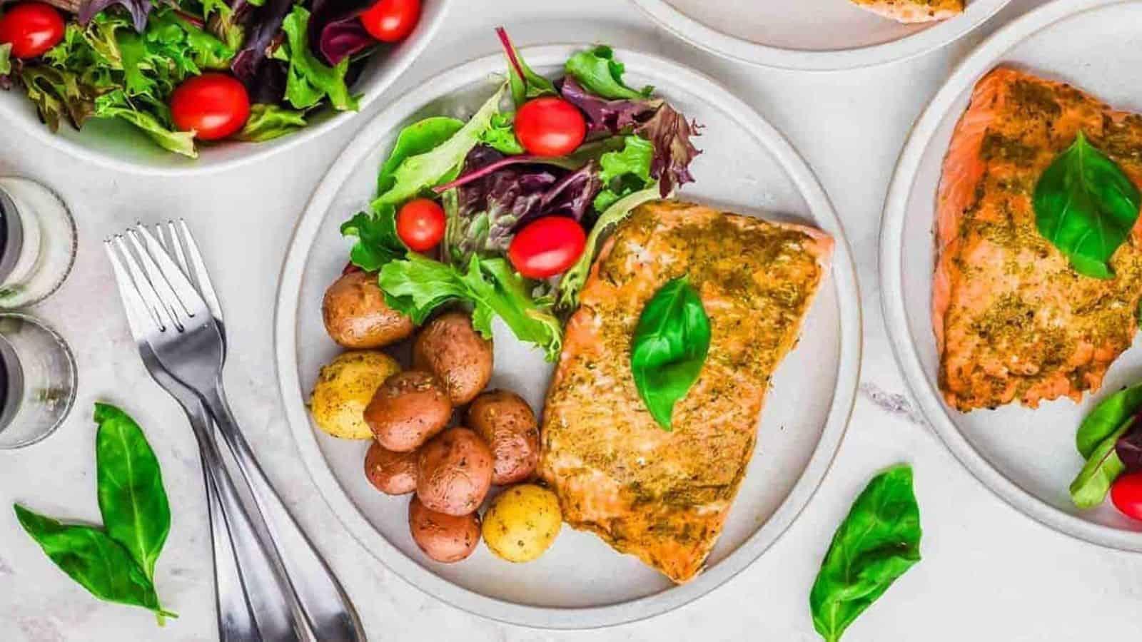 Top view of pesto salmon in a plate.