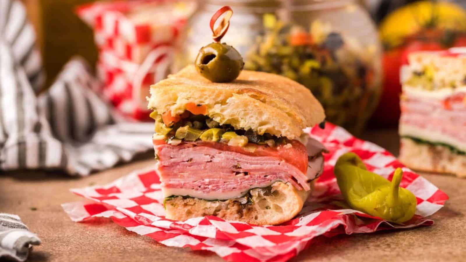 Close-up of a slice of pressed Italian picnic sandwich.