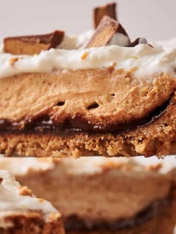 A slice of Reese's pie sits on a cake slice, ready to be served.