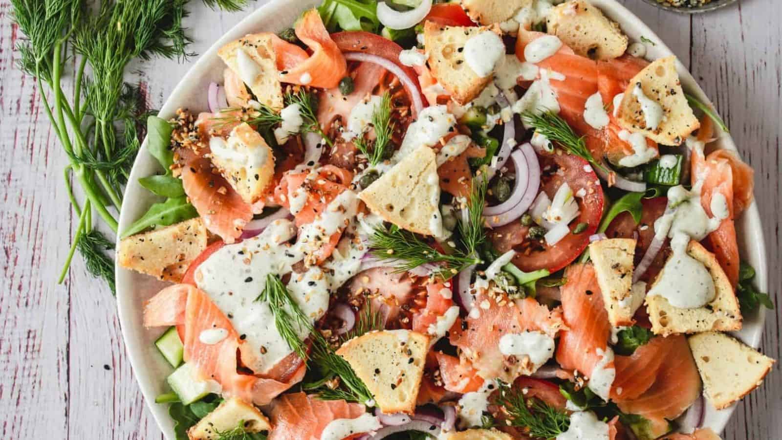 Overhead of smoked salmon and bagel salad.