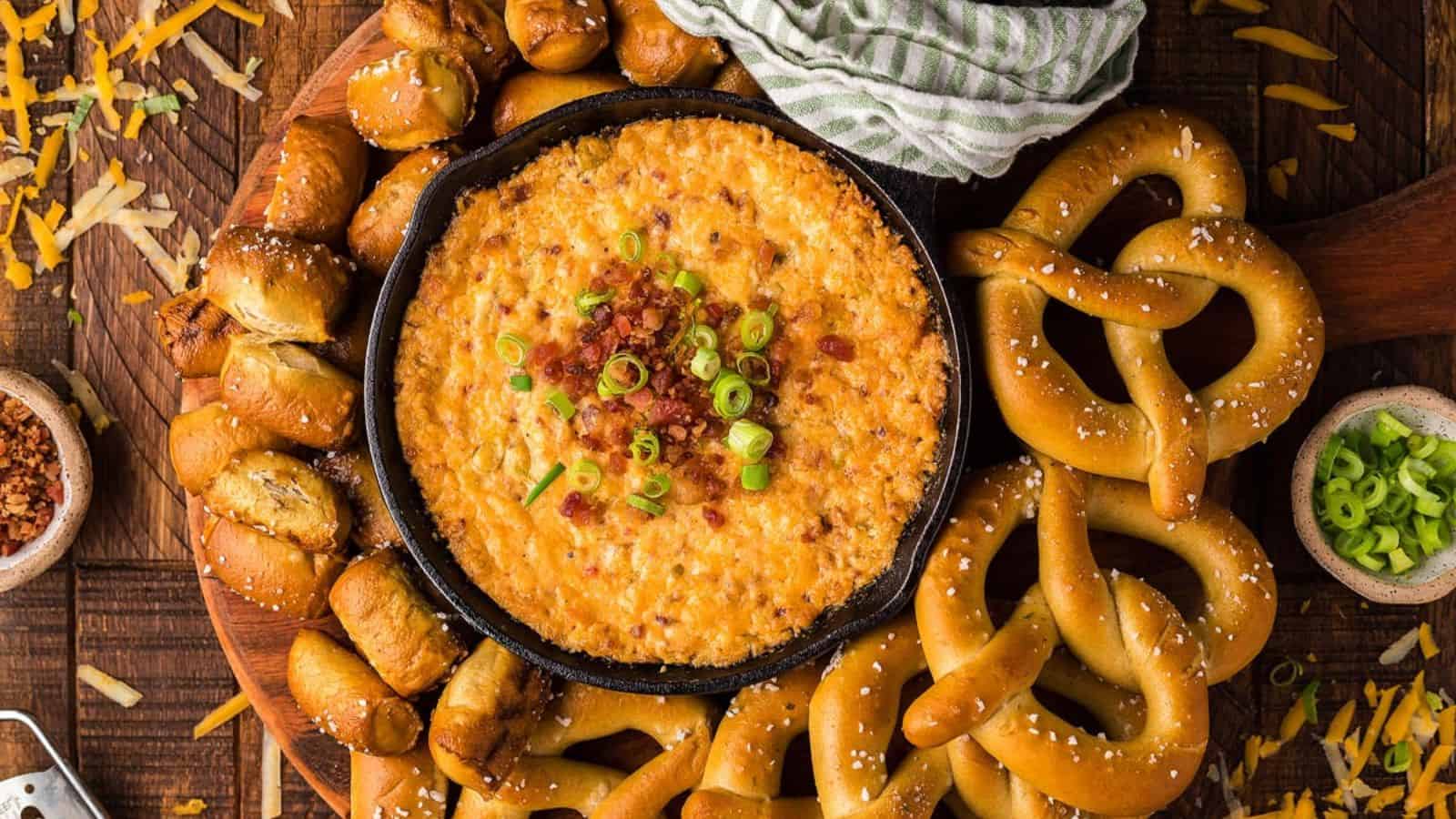 An image of smoked gouda bacon cheddar cheese dip for pretzels.