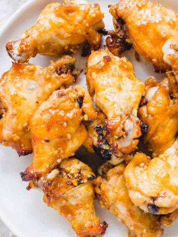 The best chicken wing marinade on a white plate.