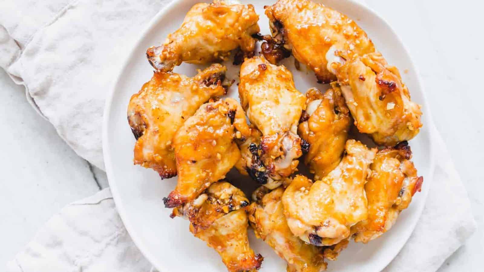 The best chicken wing marinade on a white plate.