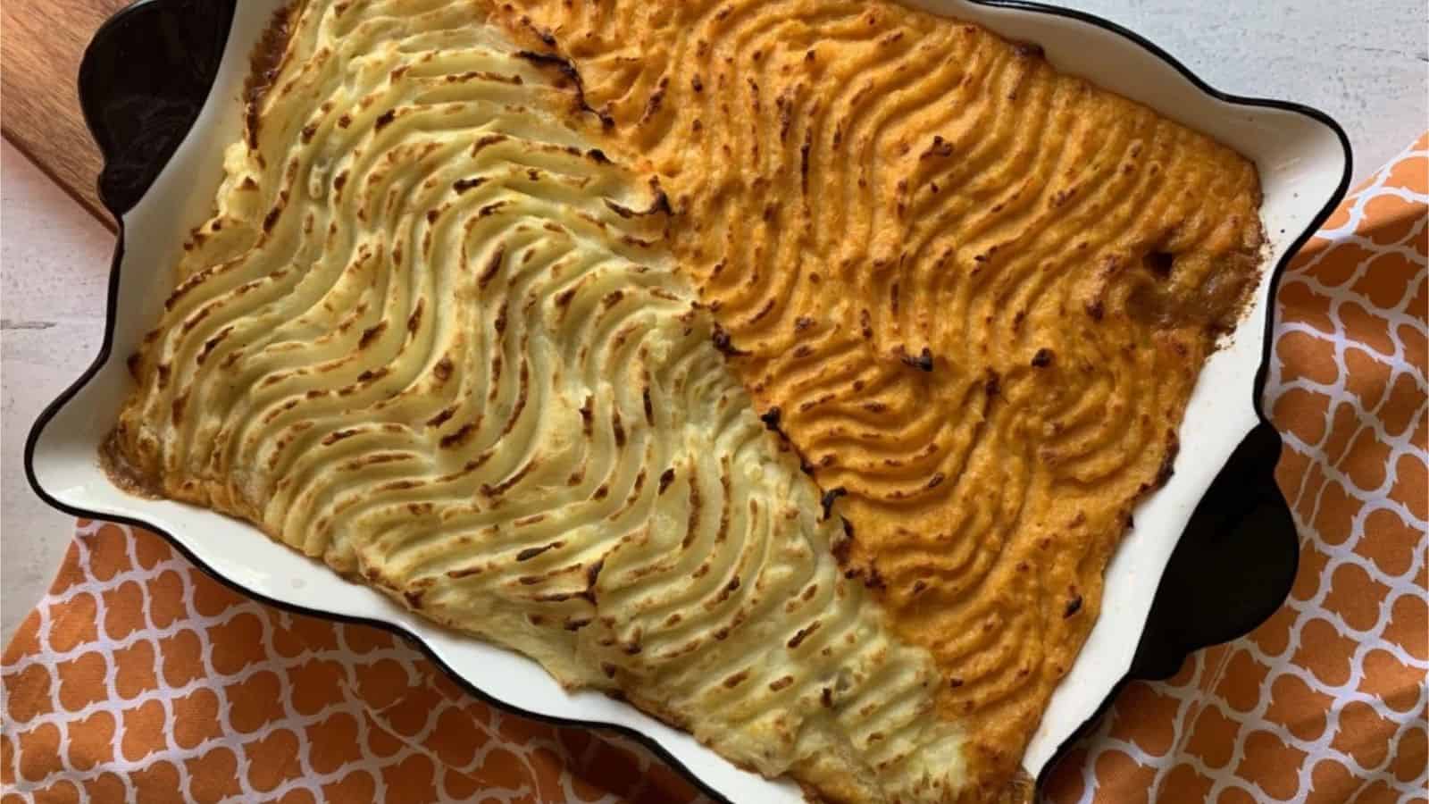 Hot ground beef gravy and vegetables cottage pie beneath a mashed potato crust.