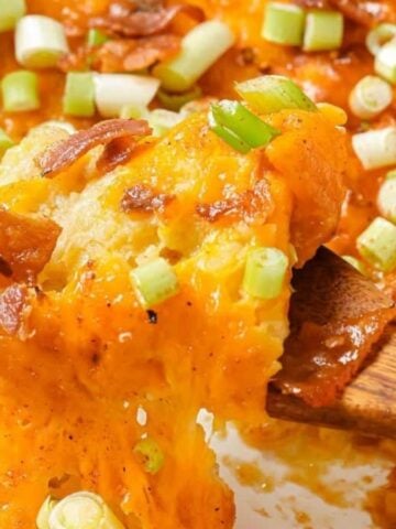 Twice baked potato casserole with bacon and green onions.