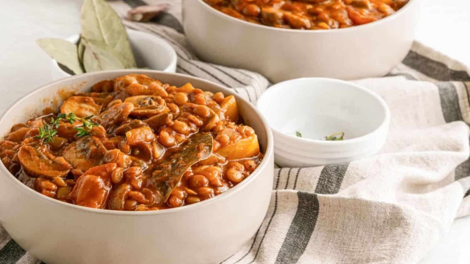 Close-up image of vegan mushroom lentil stew in a bowl.