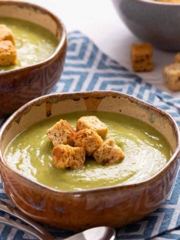 An image of zucchini soup in a bowl.